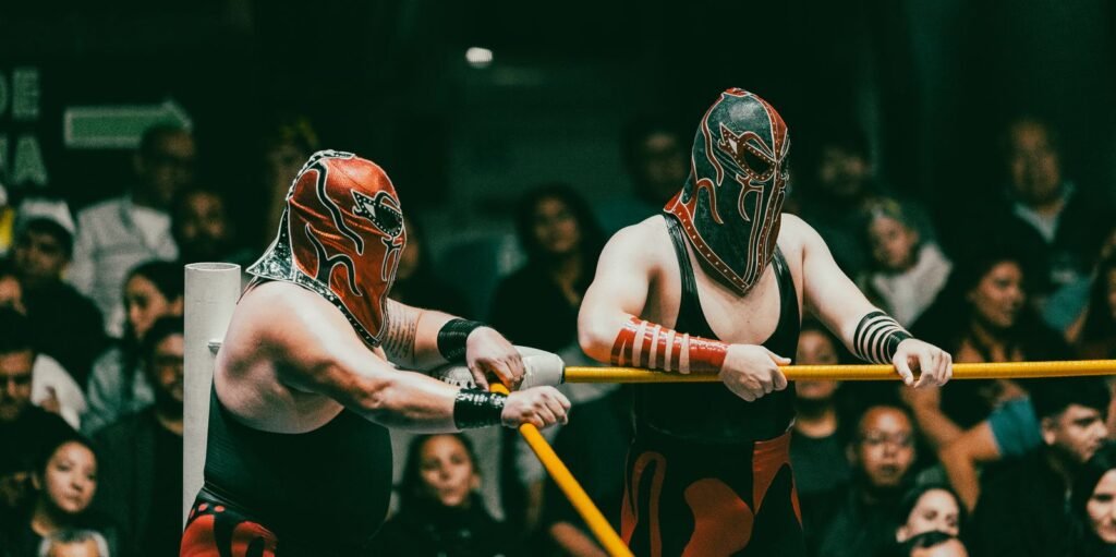Masked wrestlers competing in the ring